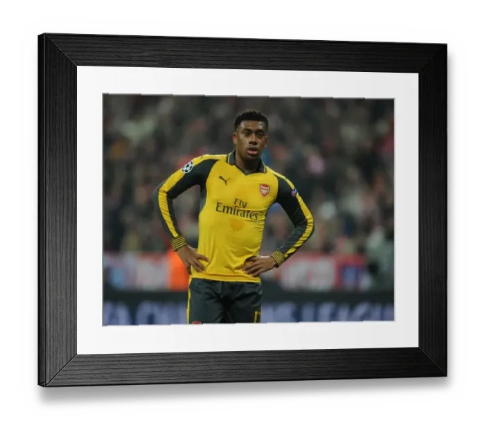 Framed Print : Arsenal's Iwobi Tackles Champions League Glory: Battle at Bayern Munich