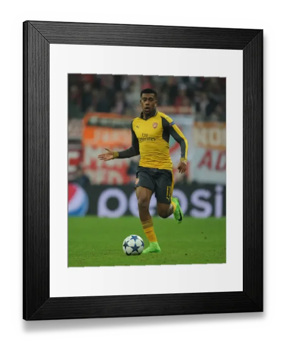 Framed Print : Arsenal's Alex Iwobi Faces Bayern Munich in Champions League Showdown Framed Print : Arsenal's Alex Iwobi Faces Bayern Munich in Champions League Showdown