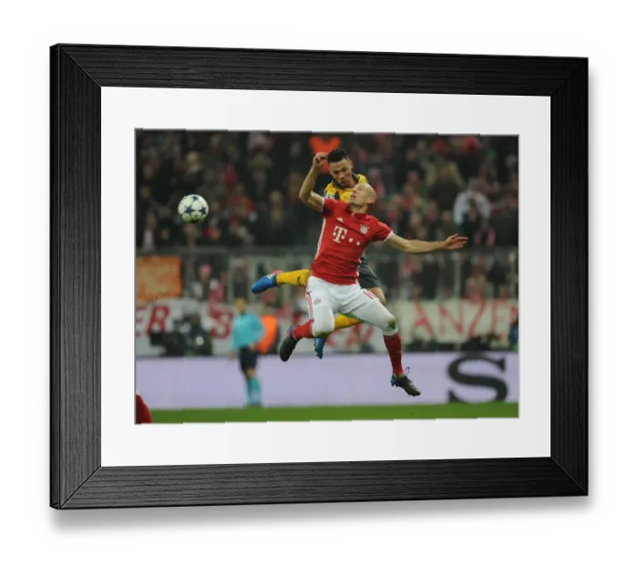 Framed Print : Arsenal's Kieran Gibbs Faces Off Against Bayern Munich's Arjen Robben in Champions League Clash