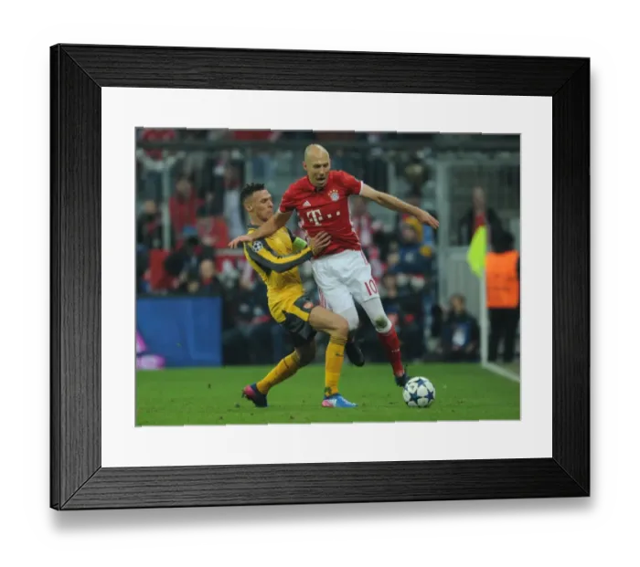 Framed Print : A Battle of Wings: Kieran Gibbs vs Arjen Robben - Arsenal vs Bayern Munich, Champions League Showdown Framed Print : A Battle of Wings: Kieran Gibbs vs Arjen Robben - Arsenal vs Bayern Munich, Champions League Showdown