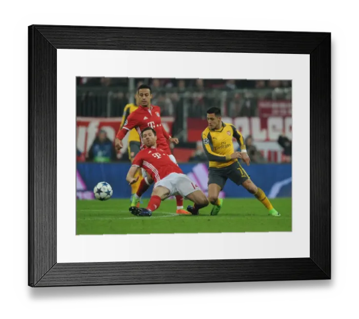 Framed Print : Alexis Sanchez vs Xabi Alonso: Battle in Munich - Arsenal vs Bayern Munich, UEFA Champions League 2016-17 Framed Print : Alexis Sanchez vs Xabi Alonso: Battle in Munich - Arsenal vs Bayern Munich, UEFA Champions League 2016-17