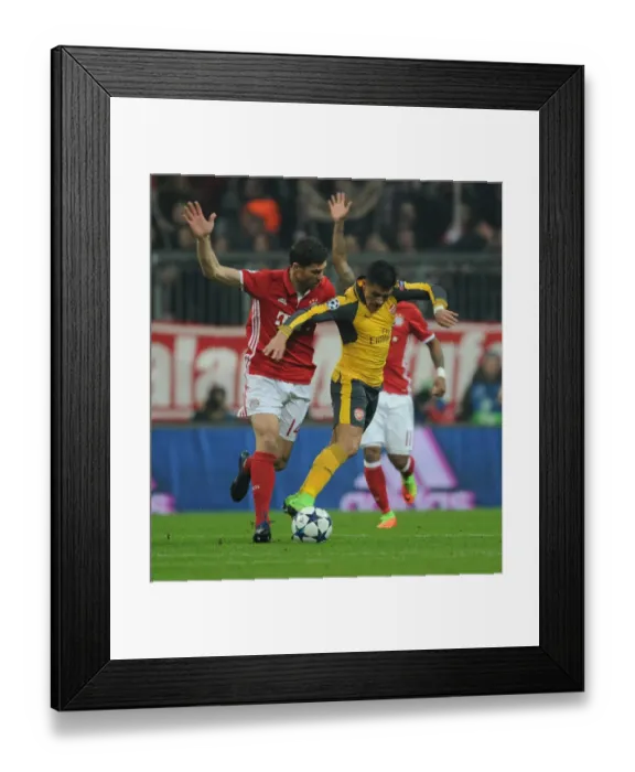 Framed Print : Battle of Midfield: Alexis Sanchez vs Xabi Alonso - Arsenal vs Bayern Munich, UEFA Champions League 2016-17