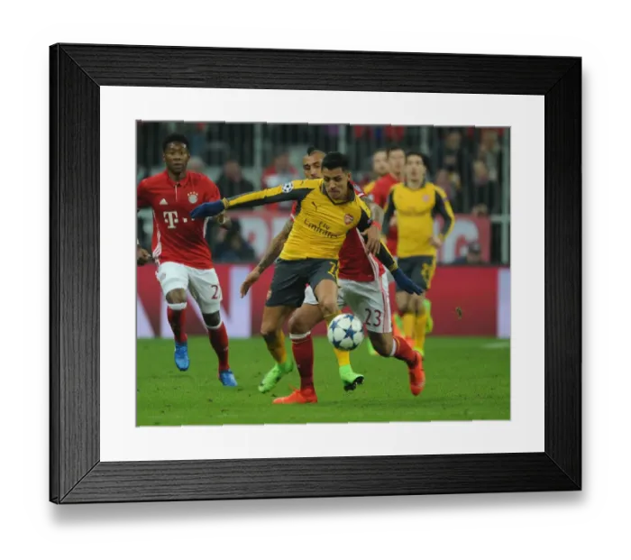 Framed Print : Battle of the Midfield Maestros: Sanchez vs. Vidal - Arsenal vs. Bayern Munich, UEFA Champions League (2016-17)