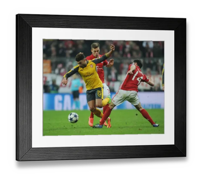 Framed Print : Champions Clash: Oxlade-Chamberlain vs. Alonso - Arsenal vs. Bayern Munich, UEFA Champions League 2016-17 (First Leg) Framed Print : Champions Clash: Oxlade-Chamberlain vs. Alonso - Arsenal vs. Bayern Munich, UEFA Champions League 2016-17 (First Leg)