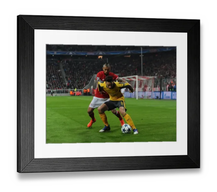 Framed Print : Mesut Ozil (Arsenal) Arturo Vidal (Bayern) Framed Print : Mesut Ozil (Arsenal) Arturo Vidal (Bayern)