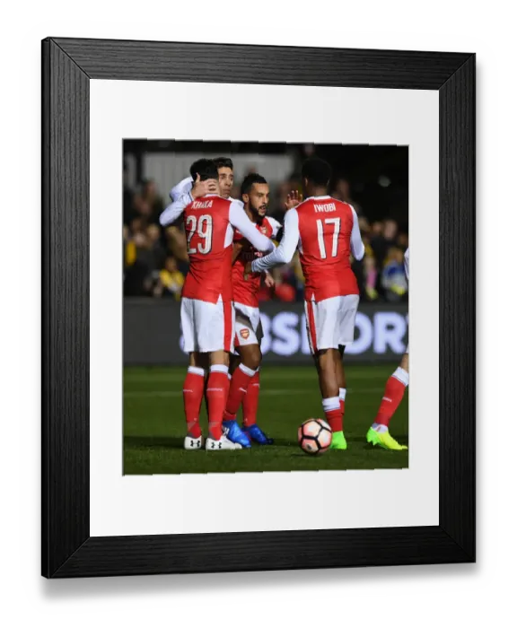 Framed Print : Theo Walcott's Double: Arsenal's FA Cup Fifth Round Triumph over Sutton United Framed Print : Theo Walcott's Double: Arsenal's FA Cup Fifth Round Triumph over Sutton United