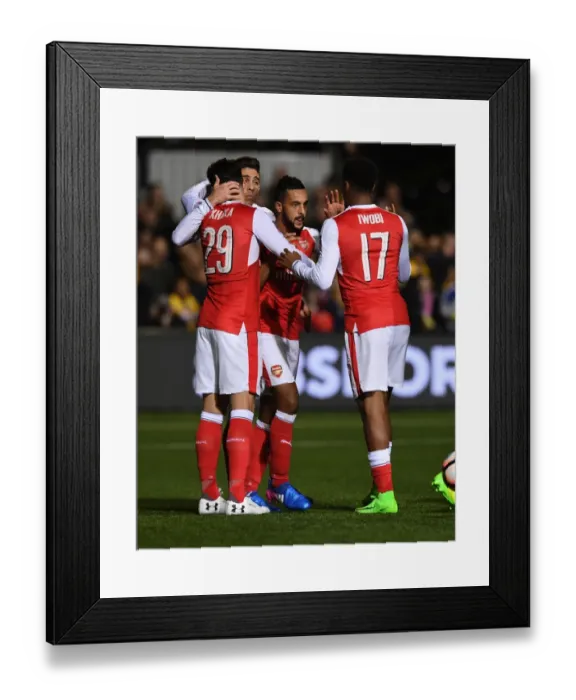 Framed Print : Theo Walcott's Brace: Arsenal's Emirates FA Cup Victory over Sutton United