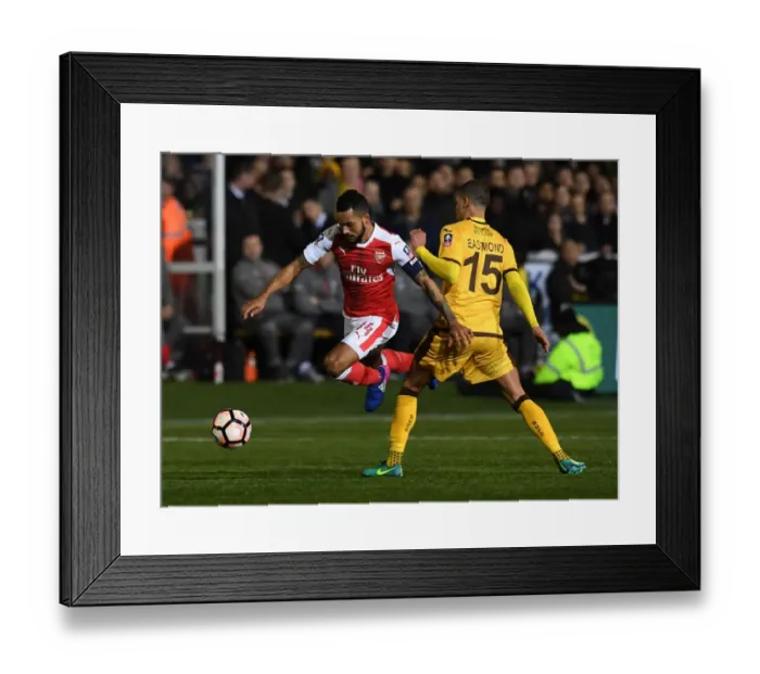 Framed Print : Theo Walcott's Breakthrough: Sutton United vs. Arsenal in the FA Cup Fifth Round