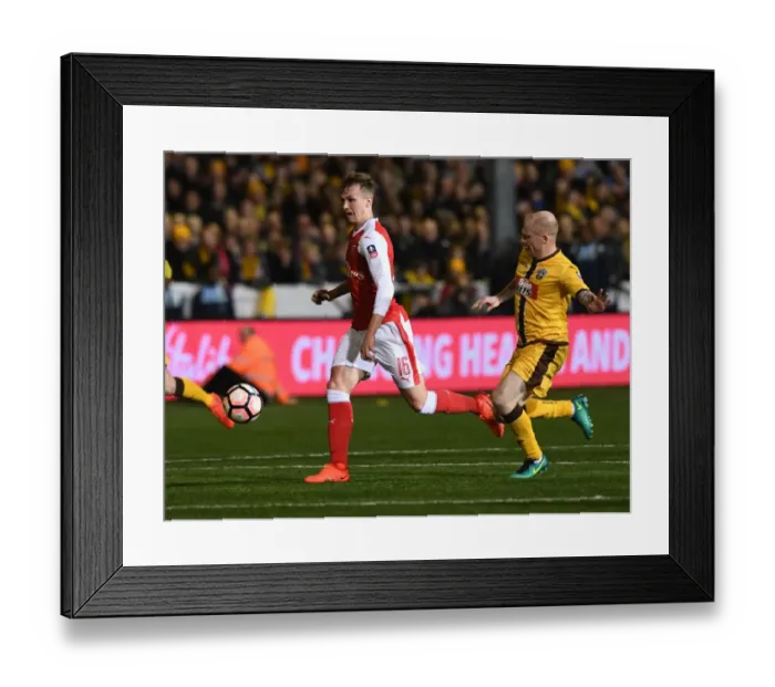 Framed Print : Rob Holding's Breakthrough: Arsenal's Shock FA Cup Victory over Sutton United
