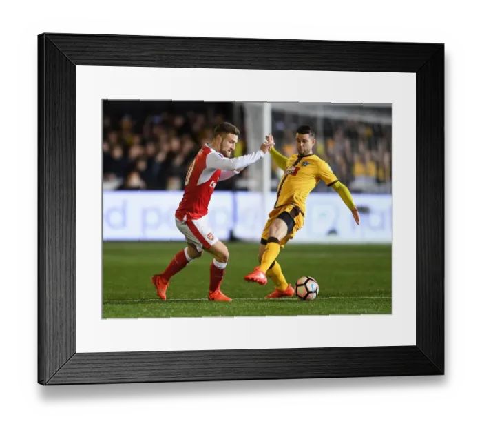 Framed Print : Mustafi vs. Fitchett: A FA Cup Fifth Round Battle - Sutton United's Surprising Showdown with Arsenal