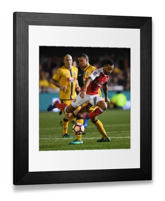 Framed Print : Theo Walcott's Magic: Arsenal's FA Cup Triumph over Sutton United