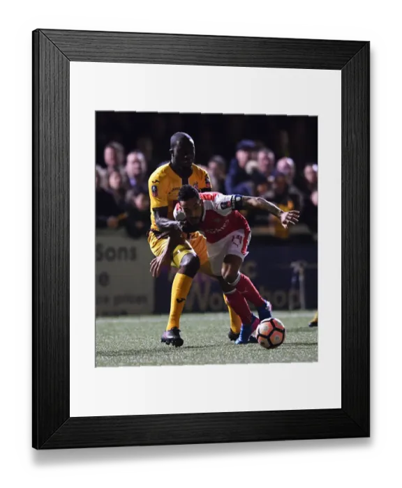 Framed Print : Theo Walcott Clashes with Kevin Amankwaah: Sutton United vs. Arsenal in The Emirates FA Cup Fifth Round