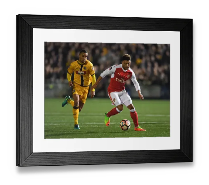Framed Print : Arsenal's Oxlade-Chamberlain vs Eastmond: FA Cup Fifth Round Clash Framed Print : Arsenal's Oxlade-Chamberlain vs Eastmond: FA Cup Fifth Round Clash