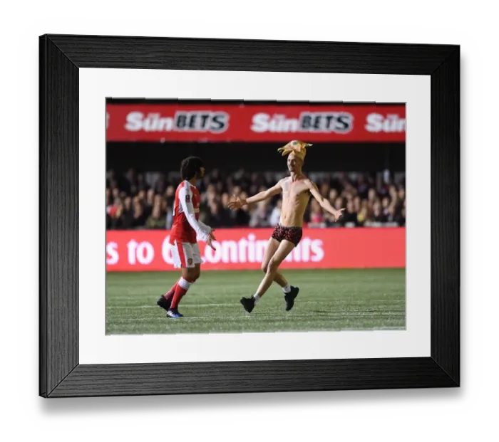 Framed Print : Sutton United's Historic FA Cup Upset: The Shocking Pitch Invasion Against Arsenal Framed Print : Sutton United's Historic FA Cup Upset: The Shocking Pitch Invasion Against Arsenal