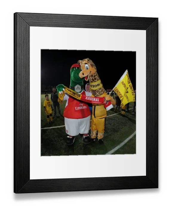 Framed Print : Gunnersaurus vs. Jenny the Giraffe: A FA Cup Fifth Round Mascot Showdown Framed Print : Gunnersaurus vs. Jenny the Giraffe: A FA Cup Fifth Round Mascot Showdown