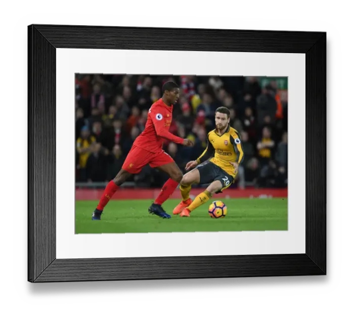 Framed Print : Mustafi vs. Wijnaldum: Intense Battle at Anfield - Liverpool vs. Arsenal, Premier League 2016-17 Framed Print : Mustafi vs. Wijnaldum: Intense Battle at Anfield - Liverpool vs. Arsenal, Premier League 2016-17