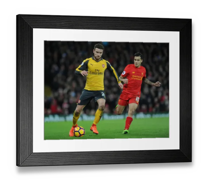 Framed Print : Mustafi vs. Coutinho: Intense Battle at Anfield - Liverpool vs. Arsenal, Premier League 2016-17