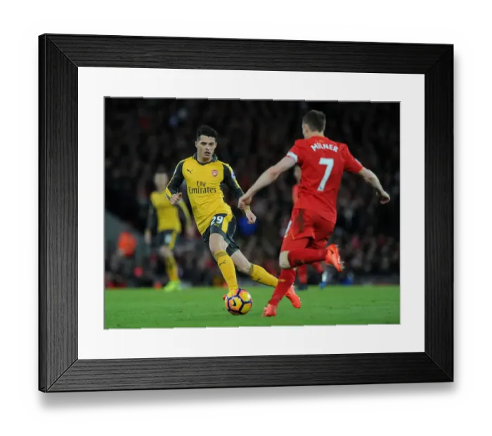 Framed Print : Granit Xhaka vs. James Milner: Intense Battle at Anfield - Liverpool vs. Arsenal, Premier League 2016-17 Framed Print : Granit Xhaka vs. James Milner: Intense Battle at Anfield - Liverpool vs. Arsenal, Premier League 2016-17