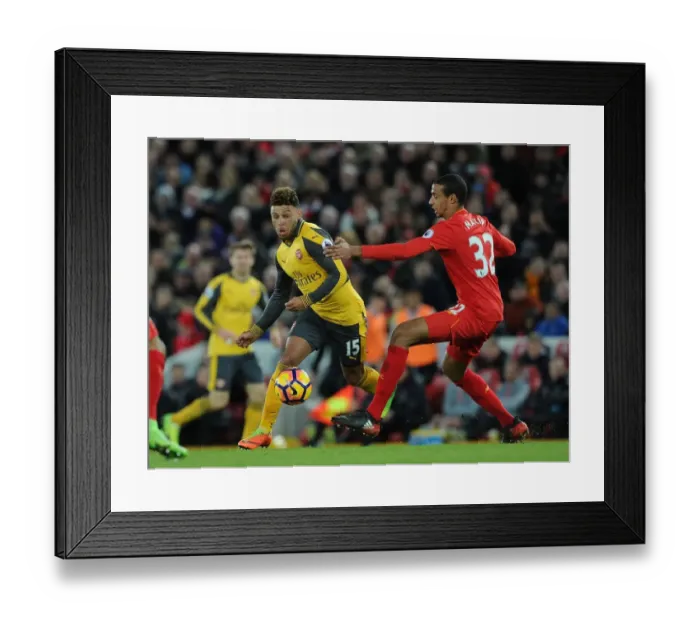 Framed Print : Clash at Anfield: Oxlade-Chamberlain vs. Matip - Premier League Showdown Framed Print : Clash at Anfield: Oxlade-Chamberlain vs. Matip - Premier League Showdown