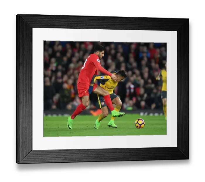 Framed Print : Arsenal's Alexis Sanchez Outmaneuvers Emre Can: Thrilling Premier League Clash between Arsenal and Liverpool (2016-17)