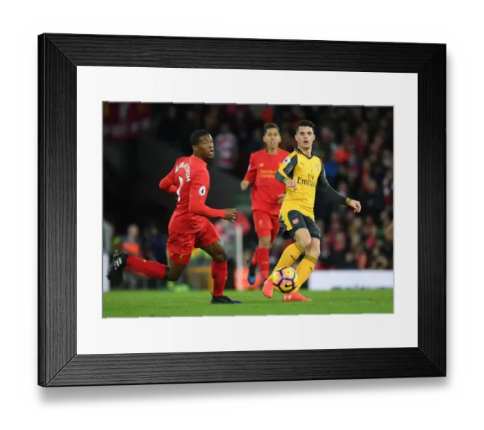 Framed Print : Xhaka vs. Wijnaldum: Battle at Anfield - Liverpool vs. Arsenal, Premier League 2016-17 Framed Print : Xhaka vs. Wijnaldum: Battle at Anfield - Liverpool vs. Arsenal, Premier League 2016-17