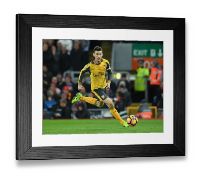 Framed Print : Laurent Koscielny Faces Off at Anfield: Liverpool vs. Arsenal, Premier League 2016-17