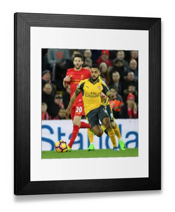 Framed Print : Theo Walcott Faces Liverpool: Premier League Showdown (2016-17) Framed Print : Theo Walcott Faces Liverpool: Premier League Showdown (2016-17)