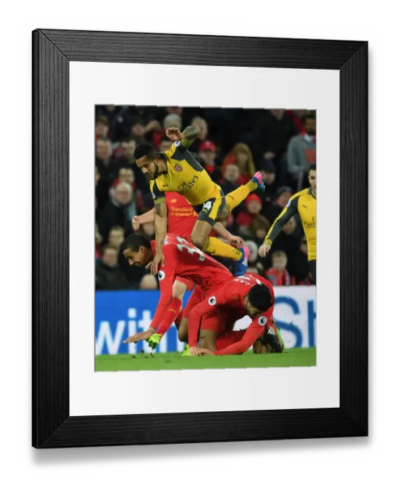 Framed Print : Theo Walcott vs. Liverpool's Defense: Intense Battle at Anfield (Liverpool v Arsenal, Premier League 2016-17) Framed Print : Theo Walcott vs. Liverpool's Defense: Intense Battle at Anfield (Liverpool v Arsenal, Premier League 2016-17)