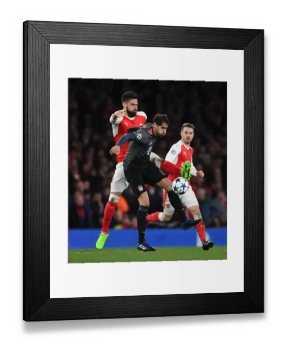 Framed Print : Arsenal's Olivier Giroud Clashes with Bayern Munich's Javi Martinez in Champions League Showdown Framed Print : Arsenal's Olivier Giroud Clashes with Bayern Munich's Javi Martinez in Champions League Showdown