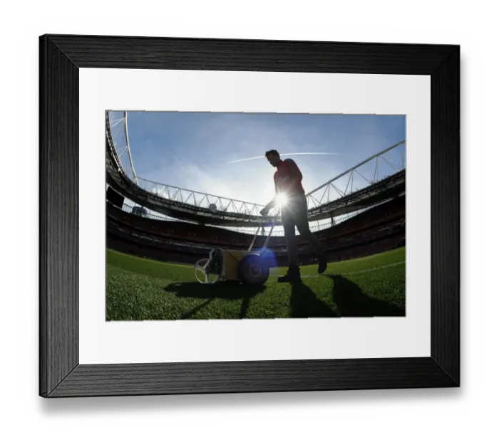 Framed Print : Preparing for Battle: Arsenal vs. Bayern Munich - Champions League Showdown at Emirates Turf