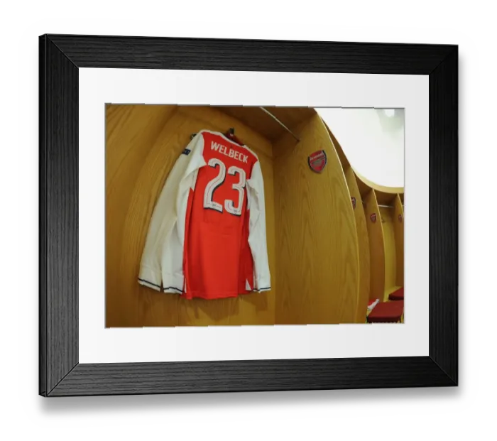 Framed Print : Arsenal's Welbeck: Pre-Match Focus in the Changing Room before Arsenal vs. Bayern Munich (2016-17)