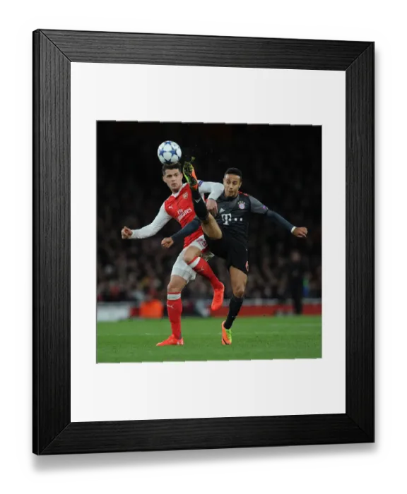 Framed Print : Arsenal vs. Bayern Munich: Granit Xhaka vs. Thiago Alcantara Clash in Champions League Showdown Framed Print : Arsenal vs. Bayern Munich: Granit Xhaka vs. Thiago Alcantara Clash in Champions League Showdown