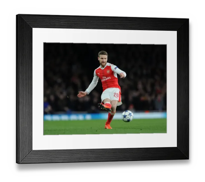 Framed Print : Mustafi's Unyielding Display: Arsenal vs. Bayern Munich UCL Clash at Emirates Stadium