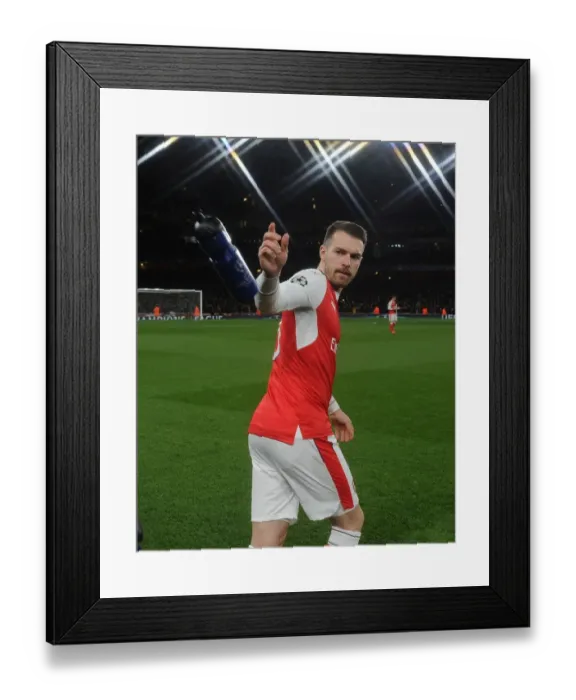 Framed Print : Arsenal's Aaron Ramsey Braces for Bayern Munich Showdown in Champions League