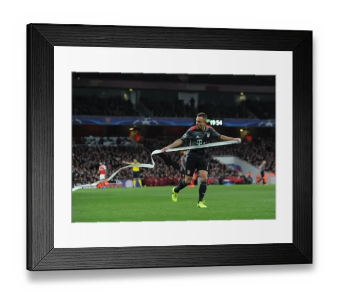 Framed Print : Rafina (Bayern) clears paper from the pitch thrown on by the Bayern fans. Arsenal 1 Framed Print : Rafina (Bayern) clears paper from the pitch thrown on by the Bayern fans. Arsenal 1