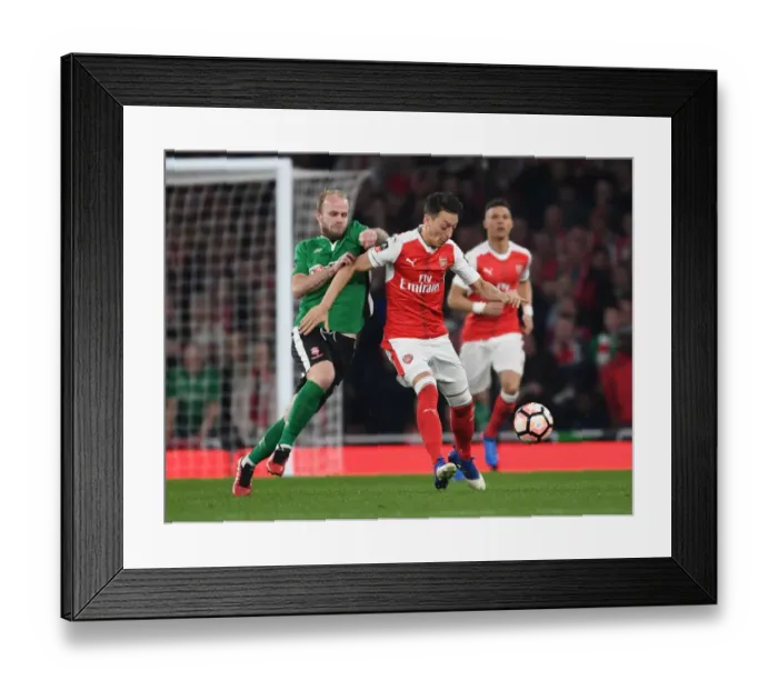 Framed Print : Mesut Ozil Clashes with Bradley Wood in Arsenal's FA Cup Quarter-Final Showdown Framed Print : Mesut Ozil Clashes with Bradley Wood in Arsenal's FA Cup Quarter-Final Showdown