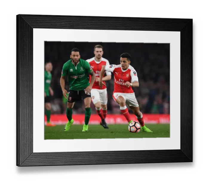 Framed Print : Arsenal's Alexis Sanchez vs. Nathan Arnold: A FA Cup Quarter-Final Battle Framed Print : Arsenal's Alexis Sanchez vs. Nathan Arnold: A FA Cup Quarter-Final Battle