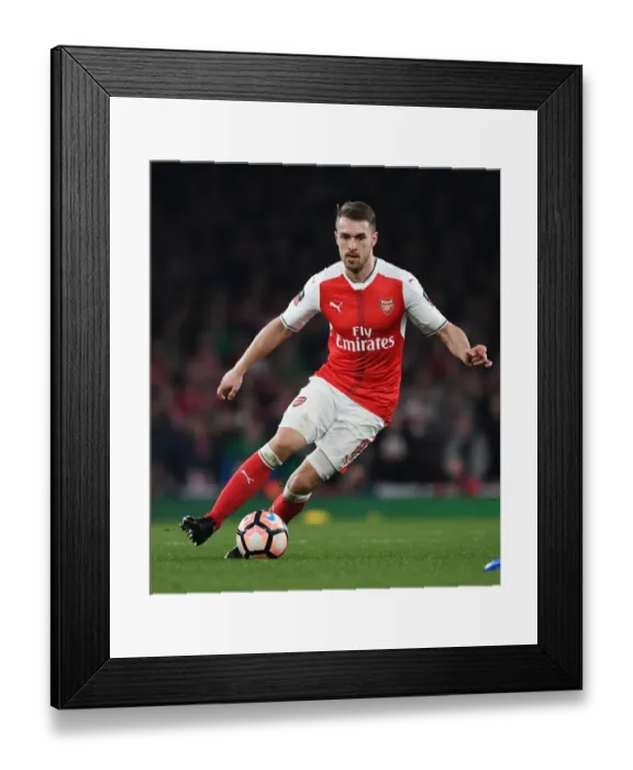Framed Print : Arsenal's Aaron Ramsey in Action against Lincoln City in FA Cup Quarter-Final Framed Print : Arsenal's Aaron Ramsey in Action against Lincoln City in FA Cup Quarter-Final