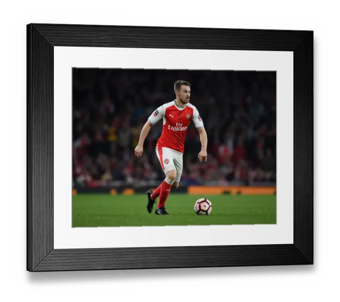 Framed Print : Arsenal's Aaron Ramsey: Midfield Brilliance Shines in FA Cup Quarter-Final Against Lincoln City Framed Print : Arsenal's Aaron Ramsey: Midfield Brilliance Shines in FA Cup Quarter-Final Against Lincoln City