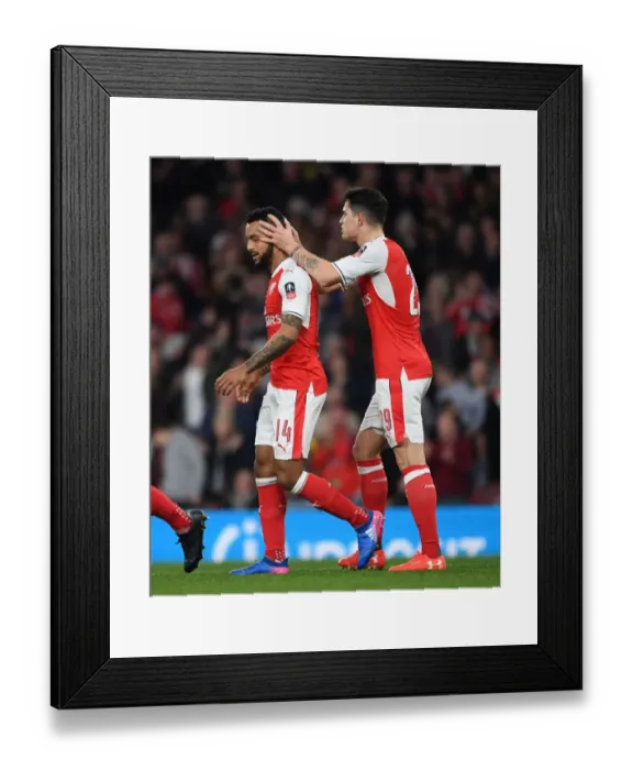 Framed Print : Arsenal's Walcott and Xhaka Celebrate Goal in FA Cup Quarter-Final vs. Lincoln City Framed Print : Arsenal's Walcott and Xhaka Celebrate Goal in FA Cup Quarter-Final vs. Lincoln City