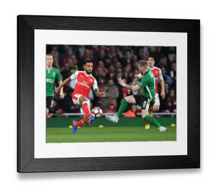 Framed Print : Theo Walcott vs Alan Power: Arsenal vs Lincoln City - Emirates FA Cup Quarter-Final Showdown