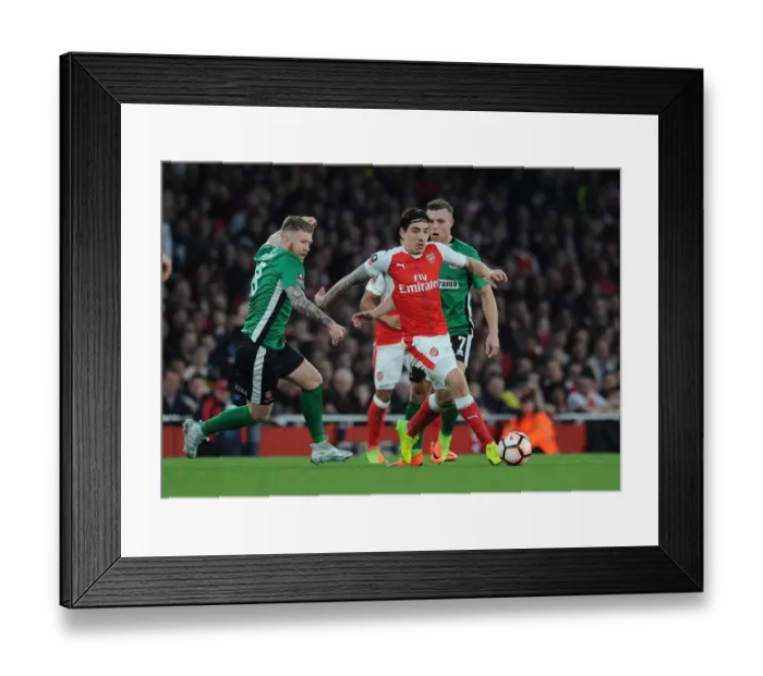 Framed Print : Arsenal's Hector Bellerin Faces Off Against Lincoln City's Alan Power in FA Cup Quarter-Final Showdown Framed Print : Arsenal's Hector Bellerin Faces Off Against Lincoln City's Alan Power in FA Cup Quarter-Final Showdown