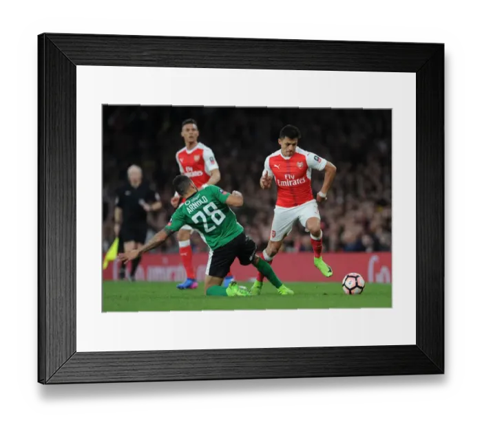 Framed Print : Arsenal's Alexis Sanchez vs. Nathan Arnold: A FA Cup Quarter-Final Showdown Framed Print : Arsenal's Alexis Sanchez vs. Nathan Arnold: A FA Cup Quarter-Final Showdown
