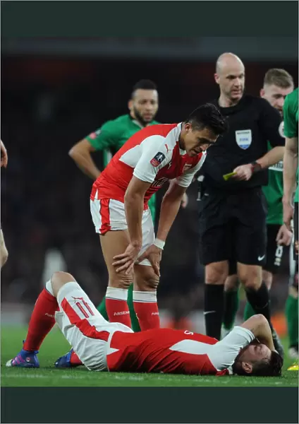 Arsenal's Sanchez and Ozil: A Moment of Support in FA Cup Quarter-Final