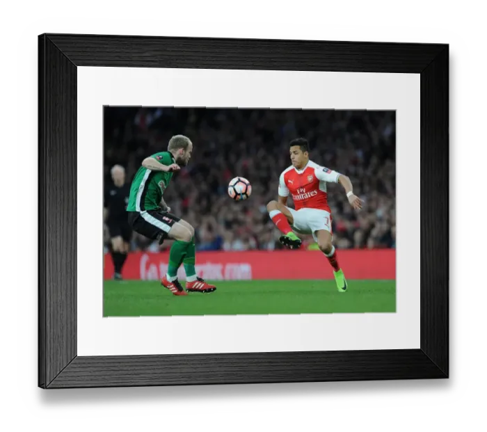 Framed Print : Arsenal's Alexis Sanchez Clashes with Lincoln City's Bradley Wood in FA Cup Quarter-Final Framed Print : Arsenal's Alexis Sanchez Clashes with Lincoln City's Bradley Wood in FA Cup Quarter-Final
