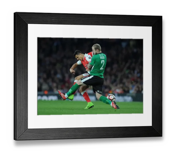Framed Print : Arsenal's Alexis Sanchez vs. Bradley Wood: FA Cup Quarter-Final Showdown at Emirates Stadium Framed Print : Arsenal's Alexis Sanchez vs. Bradley Wood: FA Cup Quarter-Final Showdown at Emirates Stadium