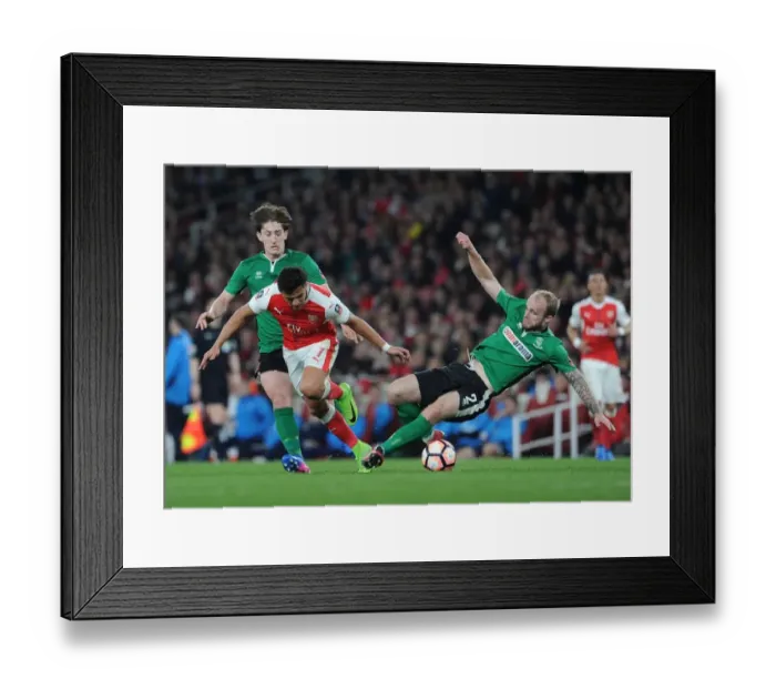 Framed Print : Arsenal's Alexis Sanchez Outmaneuvers Lincoln's Defenders in FA Cup Quarter-Final Showdown Framed Print : Arsenal's Alexis Sanchez Outmaneuvers Lincoln's Defenders in FA Cup Quarter-Final Showdown