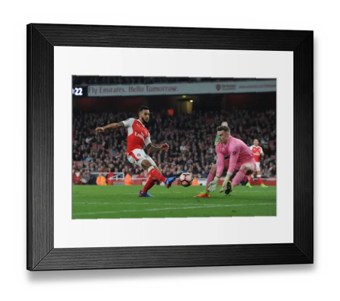 Framed Print : Theo Walcott vs. Paul Farman: A Battle in the Emirates FA Cup Quarter-Finals
