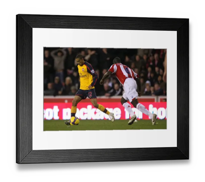 Framed Print : Gael Clichy (Arsenal) Seyi Olofinjana (Stoke) Framed Print : Gael Clichy (Arsenal) Seyi Olofinjana (Stoke)