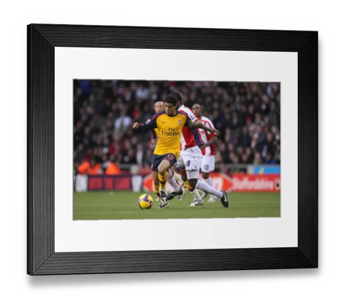 Framed Print : Denilson's Defiant Performance: Arsenal's 1:2 Victory over Stoke City at The Britannia Stadium, November 2008